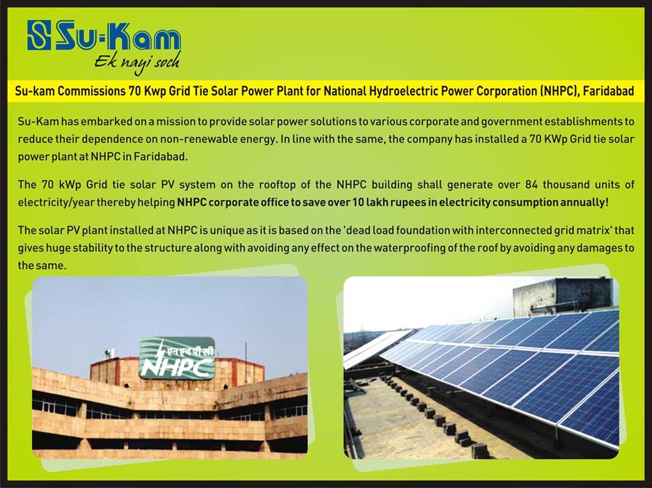 Su-Kam press flyer — commissions 70 kWp grid-tie solar power plant for NHPC Faridabad with building and rooftop photos