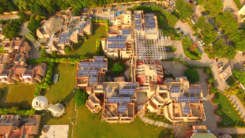 Aerial view of State Bank Academy Gurugram campus with rooftop solar arrays across buildings