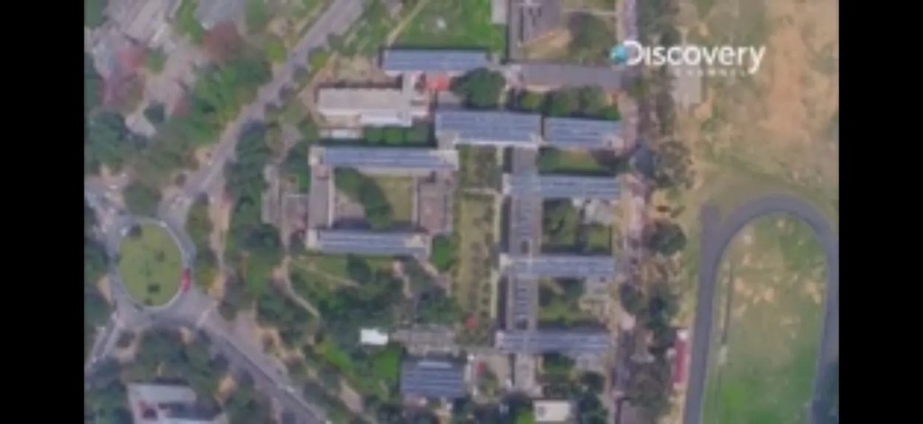 Discovery Channel Sun Fuel still — aerial of PEC Chandigarh campus with rooftop solar arrays