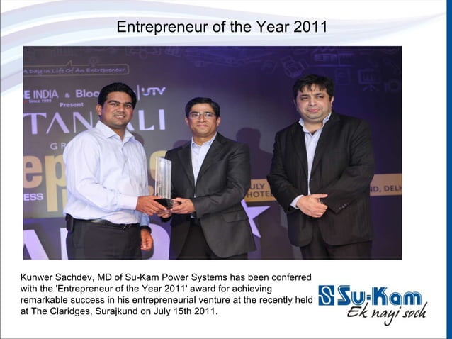 Entrepreneur of the Year — Kunwer Sachdev receiving the trophy on stage