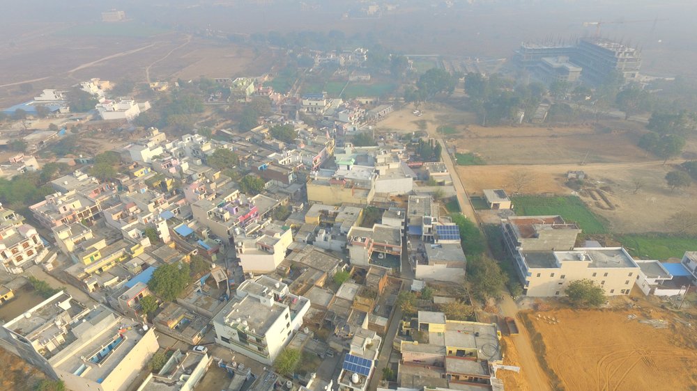 Solar panels installed on village rooftops