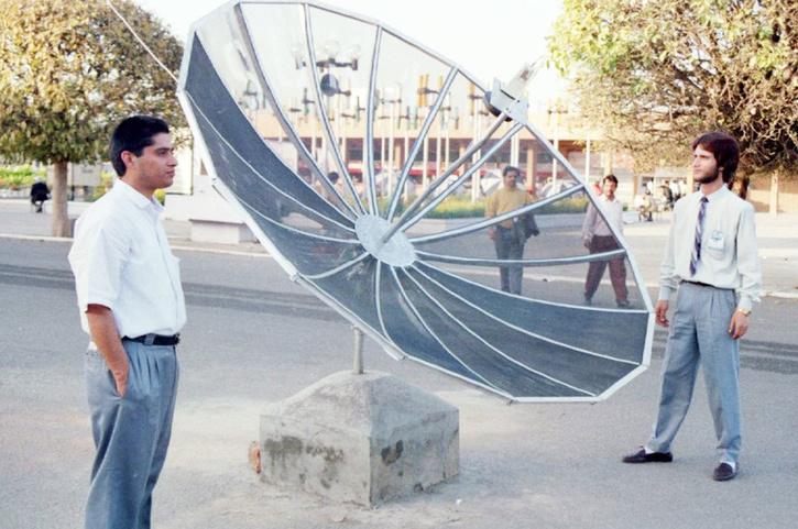 A young Kunwer Sachdev beside an early dish antenna — the cable-TV years where it all began.