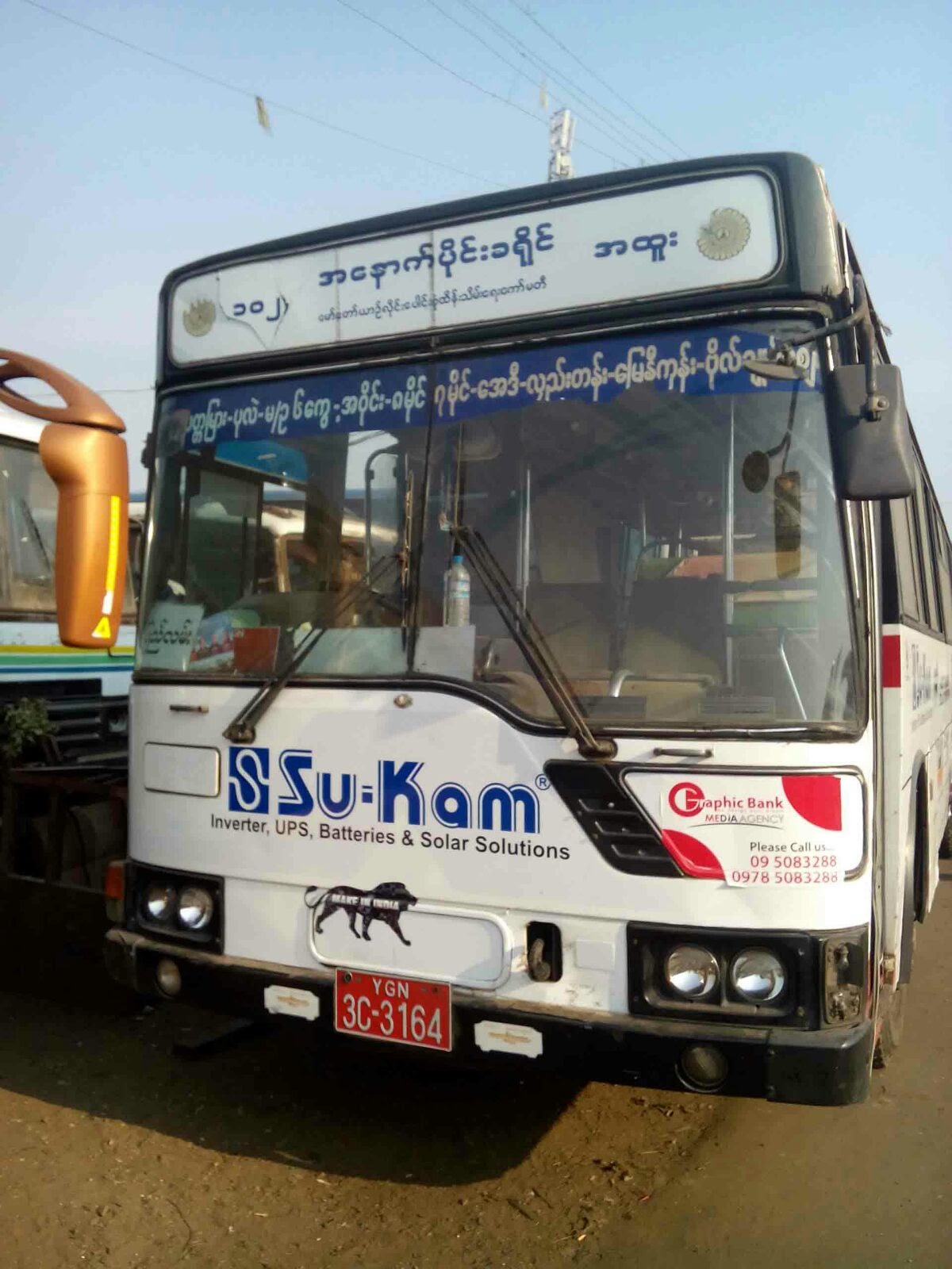 The same idea abroad — a Su-Kam bus on the roads of Yangon, Myanmar.