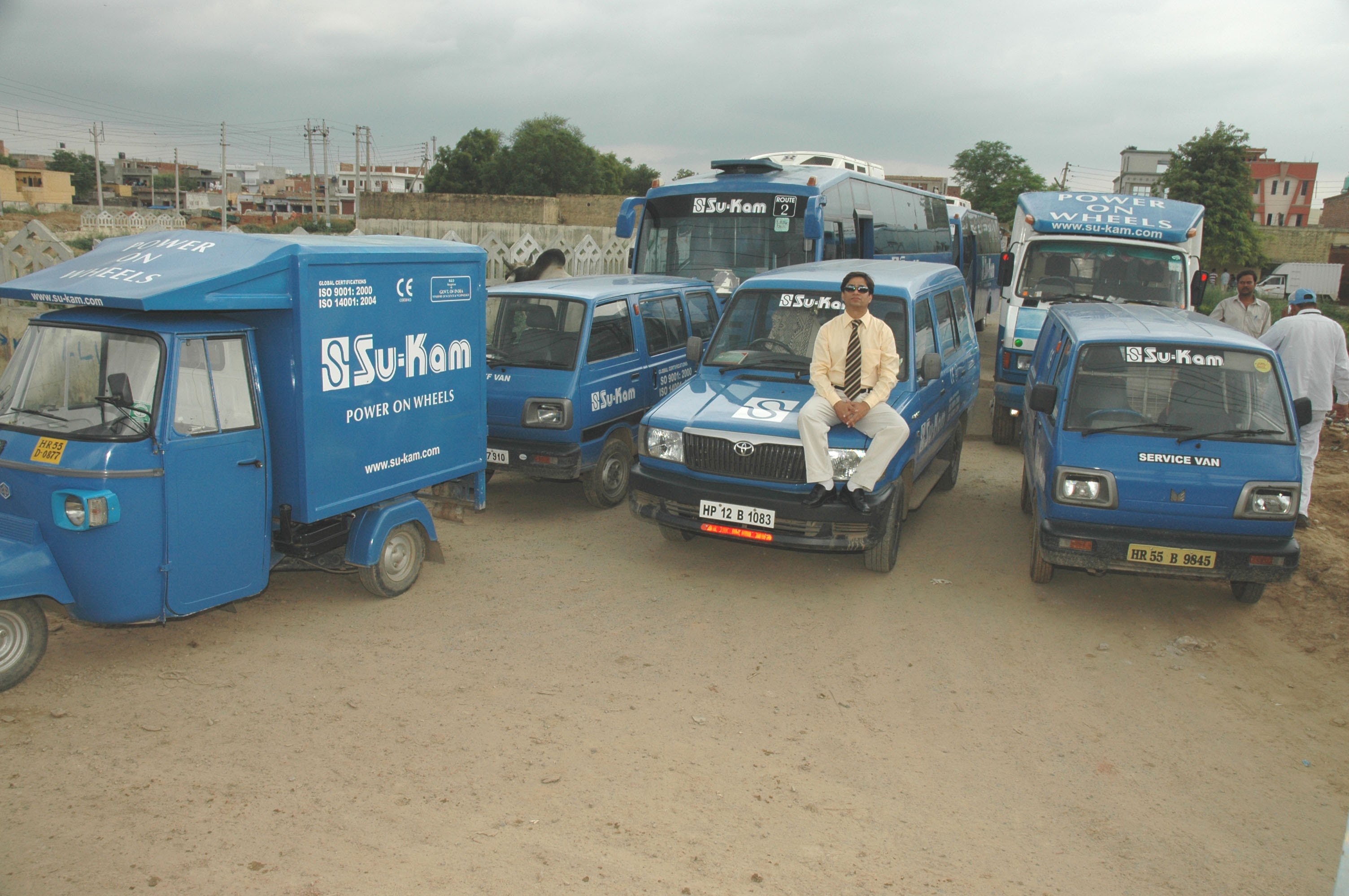 A Su-Kam branded auto-rickshaw, working the city.