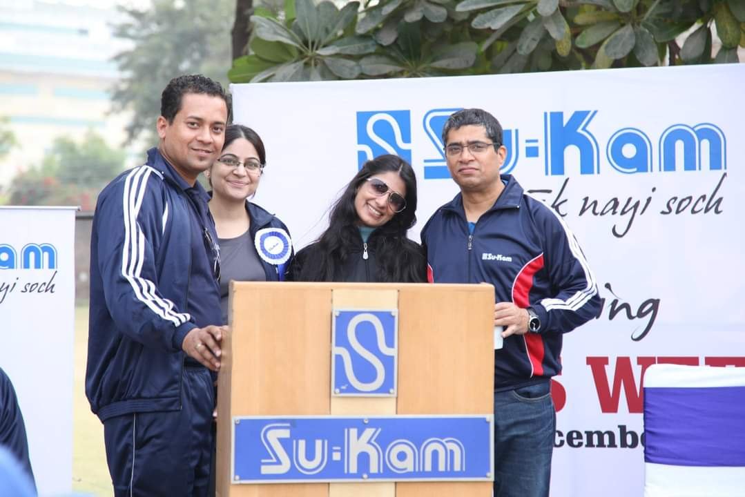 At the podium — welcoming dealers into the Su-Kam family.
