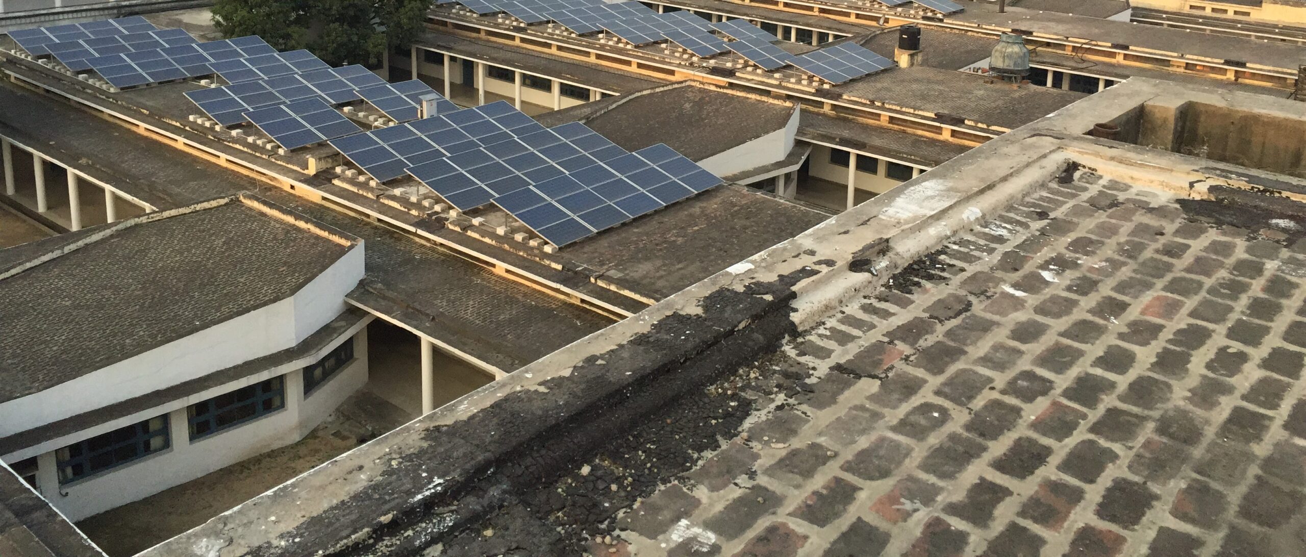 Rooftop solar across an institutional campus.